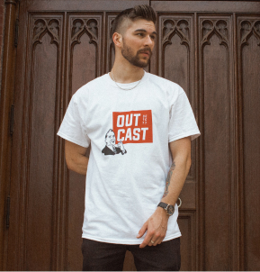 white t-shirt with graphic of a man in black and white, and an orange box, with white text reading Out Cast inside it